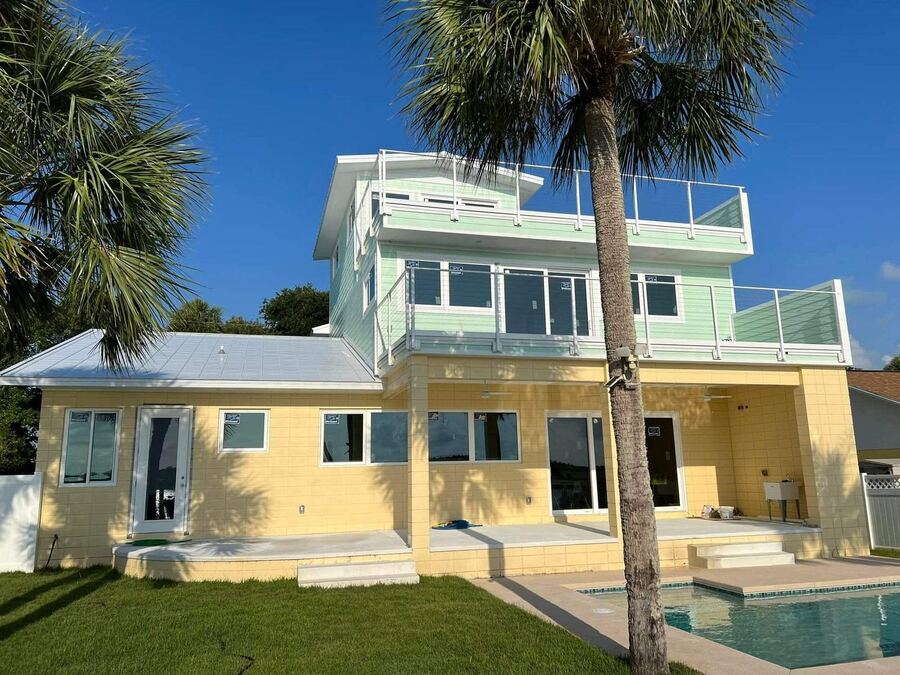 Riverside home construction, siding installation