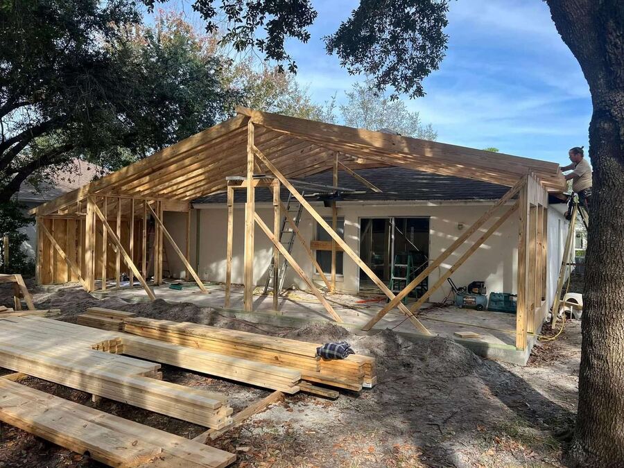Sunroom addition roof framing under construction