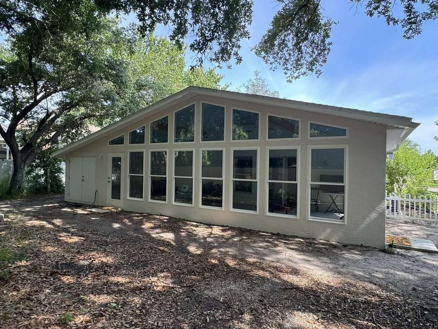Sunroom addition progress, exterior view